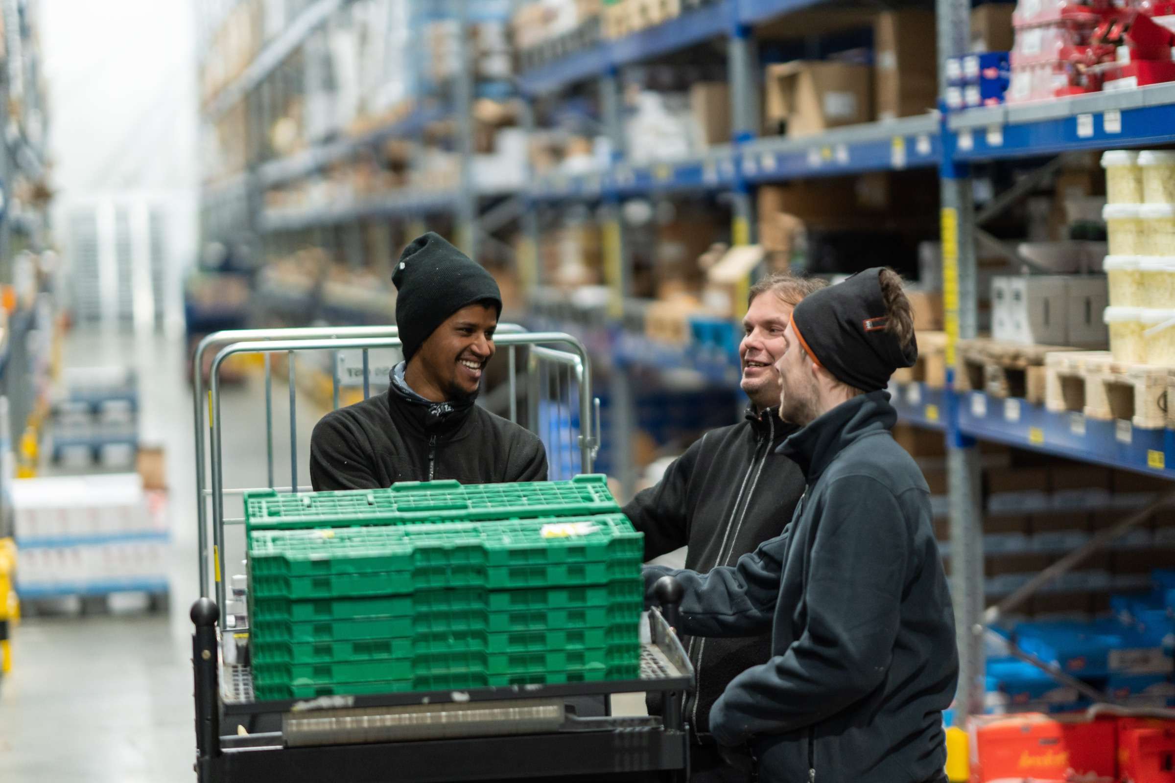 Two team members coordinating loads